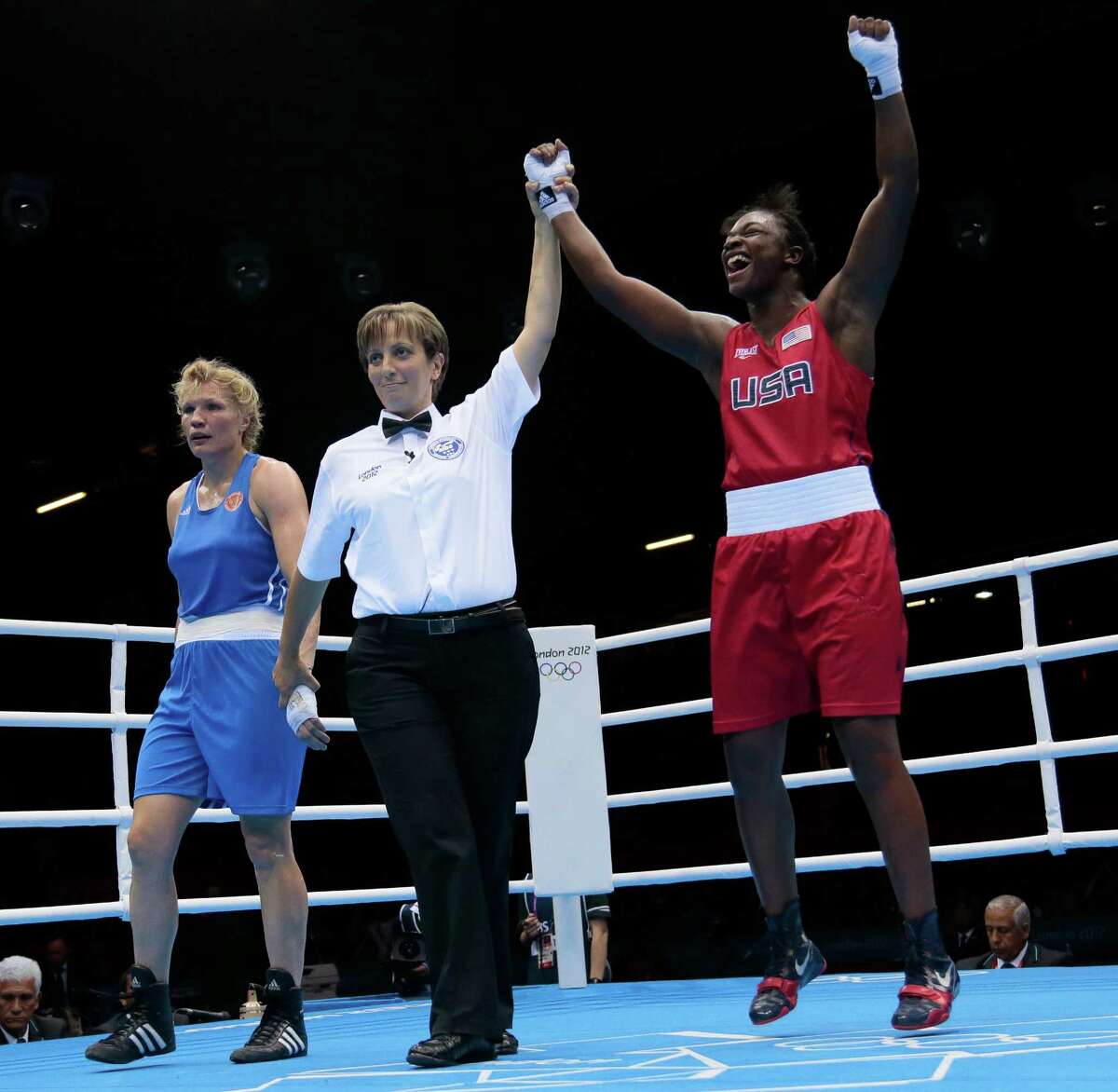 Claressa Shields (right) celebrates winning gold against Russia’s Nadezda Torlopova in the women’s middleweight division. The American men failed to medal for the first time.