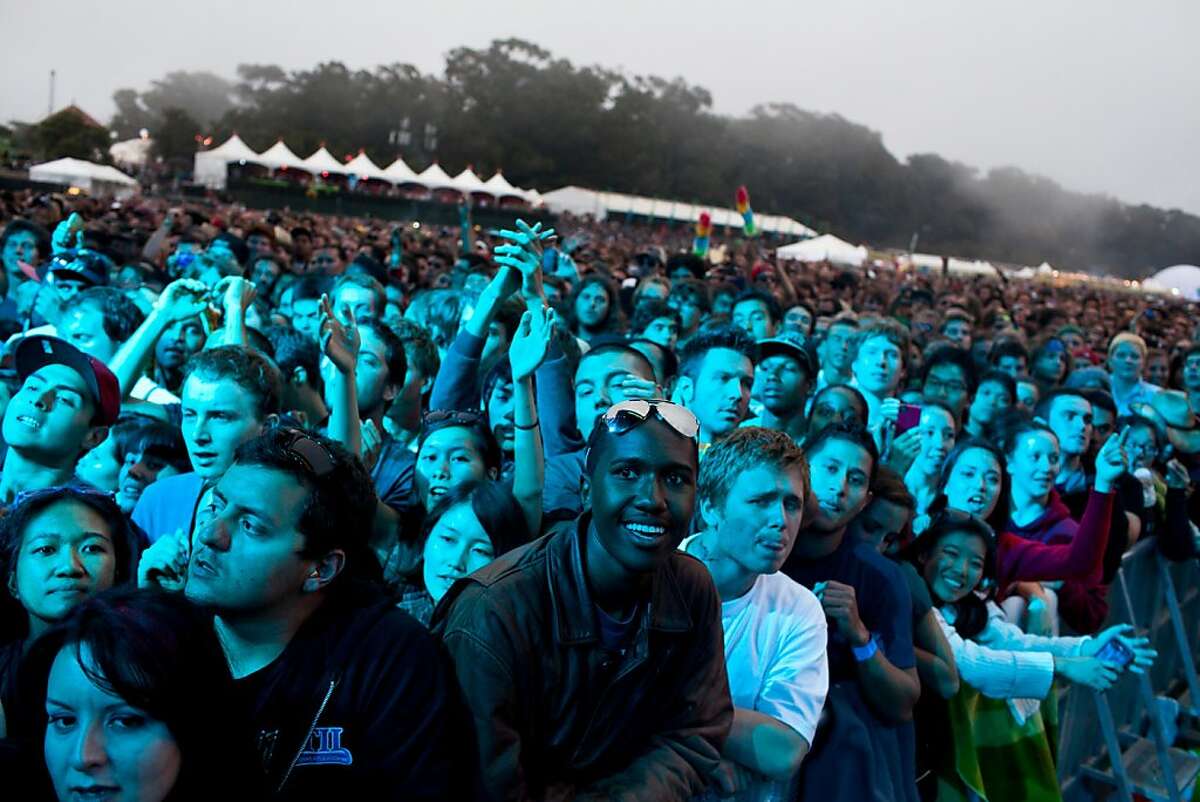 Audience members cheer as Stevie Wonder takes the Lands End stage at the 2012 Outside Lands Music Festival in Golden Gate Park in San Francisco, Calif., Sunday, August 12, 2012.