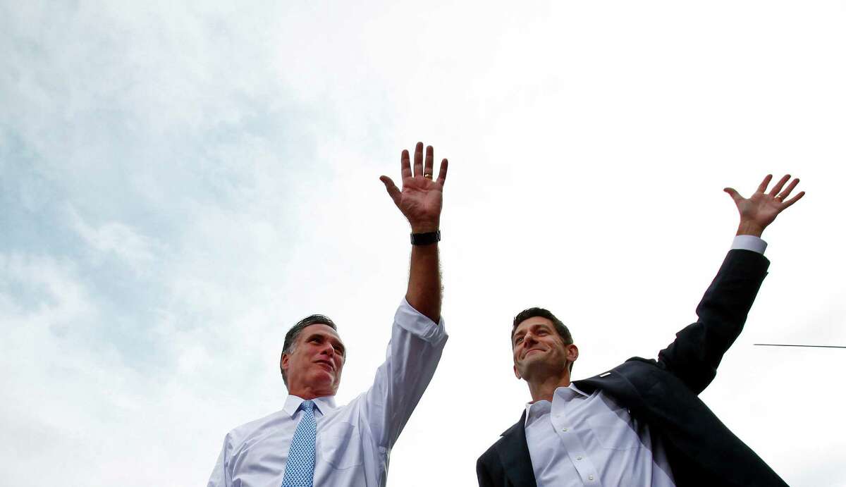 Mitt Romney, left, the presumed Republican presidential candidate, and Rep. Paul Ryan (R-WIs.) on stage during a campaign event in Norfolk, Va., Aug. 11, 2012. Romney introduced Ryan as his running mate Aug. 11, a choice that puts the issue of the nation's fiscal soundness at the center of the presidential race and sharpens the choice facing voters in November.