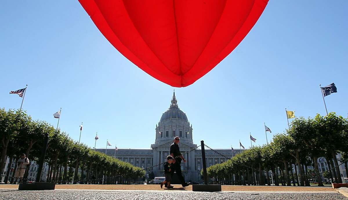 Lately, the best thing to wake up Civic Center Plaza is a dancing lotus, “Breathing Flower” by Choi Jeong Hwa, which is tied to an exhibition.