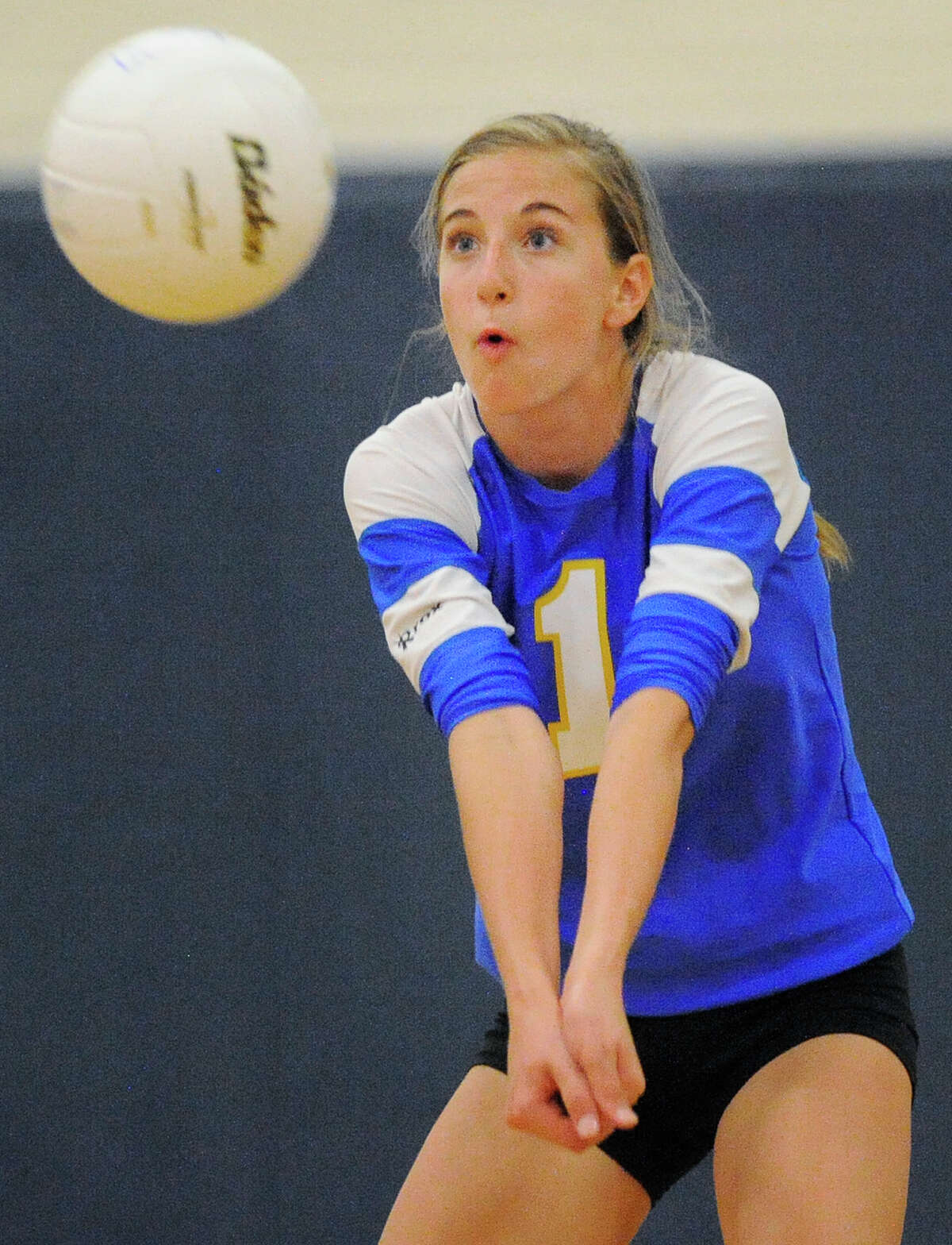 Alamo Heights' Jessica Wellford returns the ball during a high school volleyball game against Antonian, Monday, Aug. 13, 2012, at Alamo Heights High School in San Antonio.