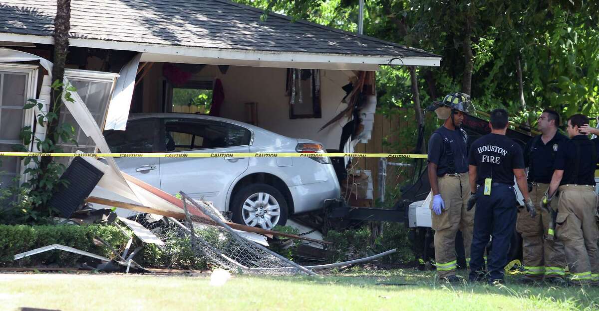 Car crashes into home, injures 2 in NW Houston