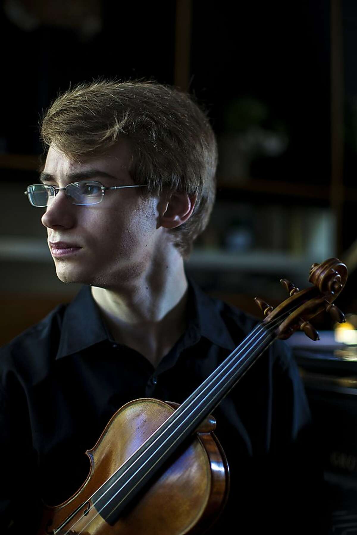 18 year-old violinist Kenneth Renshaw sits for a portrait at home in San Francisco, Calif. on Thursday, May 24, 2012. Renshaw, who has been playing violin since the age of 4, has won first prize in the senior division of the prestigious Menuhin Competition in Beijing this April. The former concertmaster of the San Francisco Symphony Youth Orchestra has also recently graduated from The Ruth Asawa San Francisco School of the Arts and is planning to attend the New England Conservatory of Music in Boston this fall.