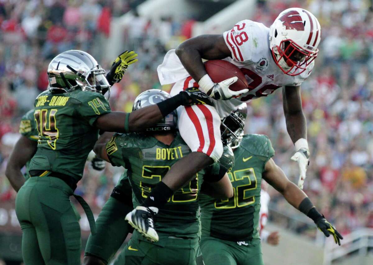 Wisconsin returns star running back Montee Ball (28), who rushed for a record-tying 39 touchdowns last season.