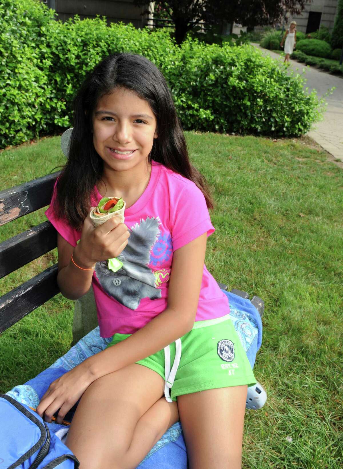 Betsy DaSilva, 11, of Cos Cob, sits on a bench at the Greenwich YWCA Wednesday, Aug. 15, 2012, with her homemade sandwich that won her a spot at a White House state dinner with the First Lady Aug. 20, 2012.