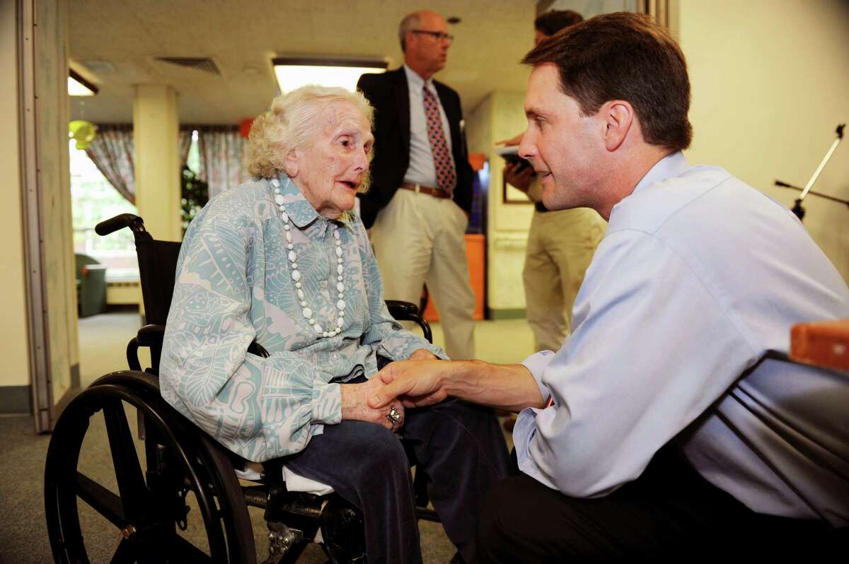 Nathaniel Witherell resident Nan Dernier speaks with U.S. Rep. Jim Himes, D-Conn., Wednesday, Aug. 15, 2012. Himes joined residents and staff for a tour of the Nathaniel Witherell short-term rehabilitation and skilled nursing center.