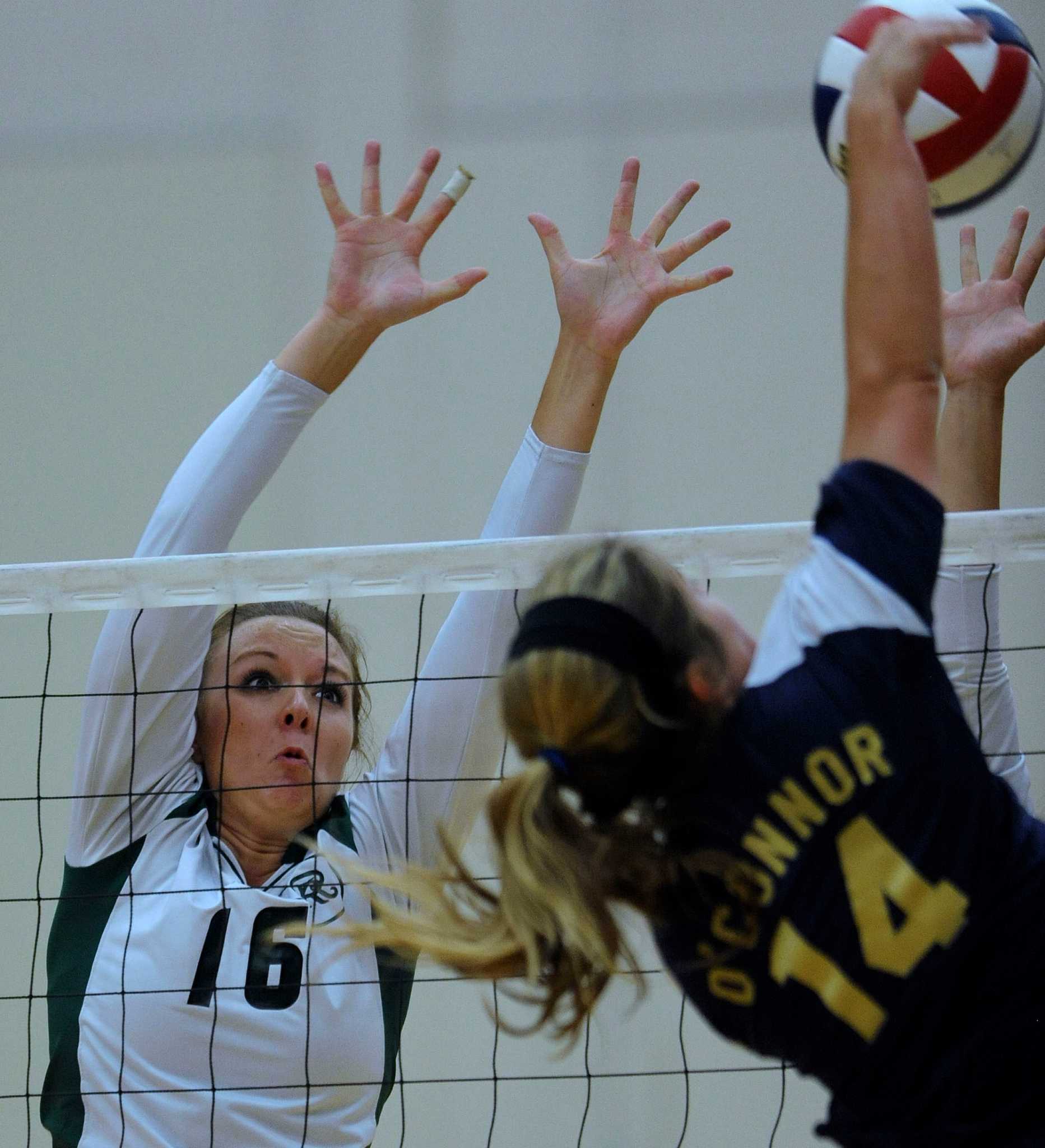 Reagan flexes muscle in volleyball win