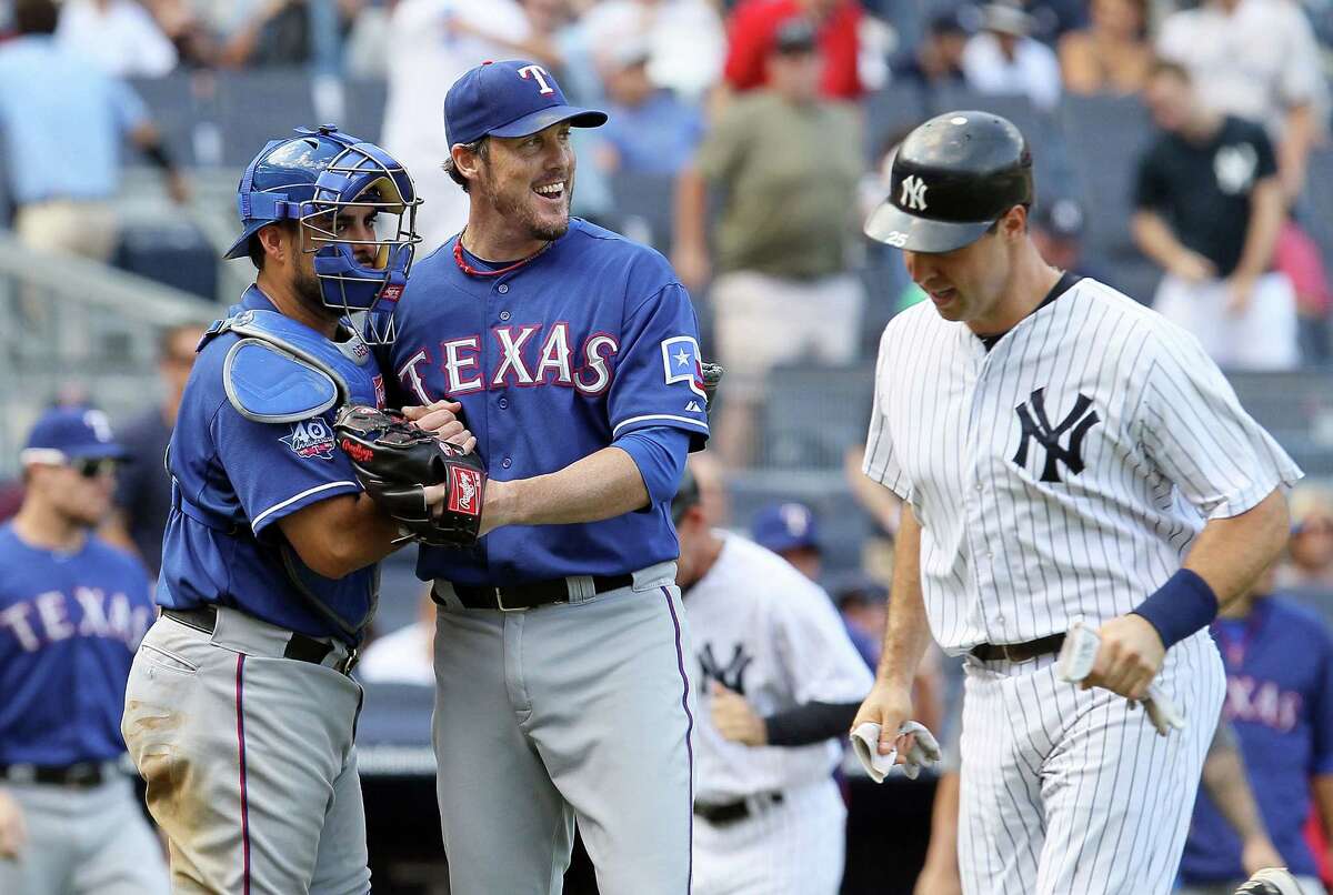 Joe Nathan (center), Geovany Soto (left) and the Rangers snapped an eight-game skid against the Yankees in New York.