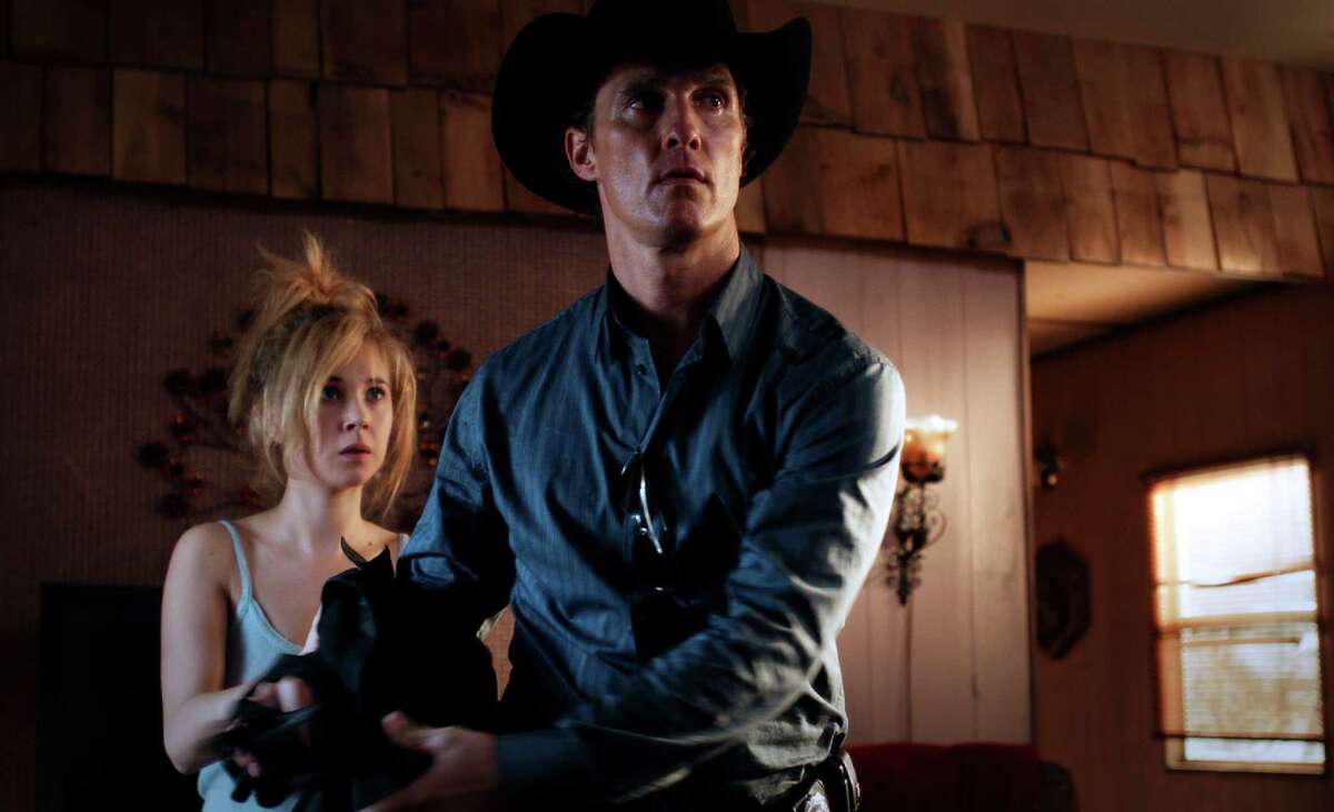 Matthew McConaughey stars as a police detective who moonlights as a killer for hire opposite Juno Temple as an innocent teen in "Killer Joe."