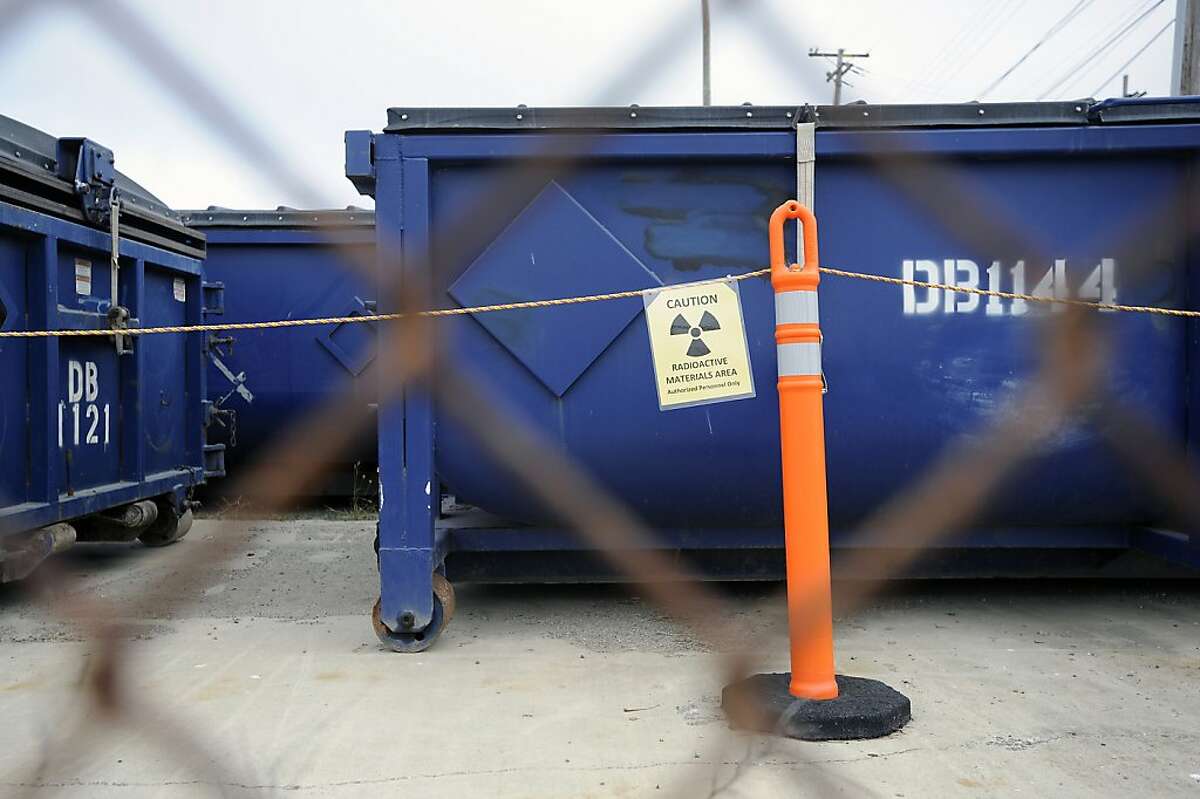 Warning signs posted by The Shaw Group, a Navy cleanup contractor accused by state health officials of mishandling a radioactive cleanup.