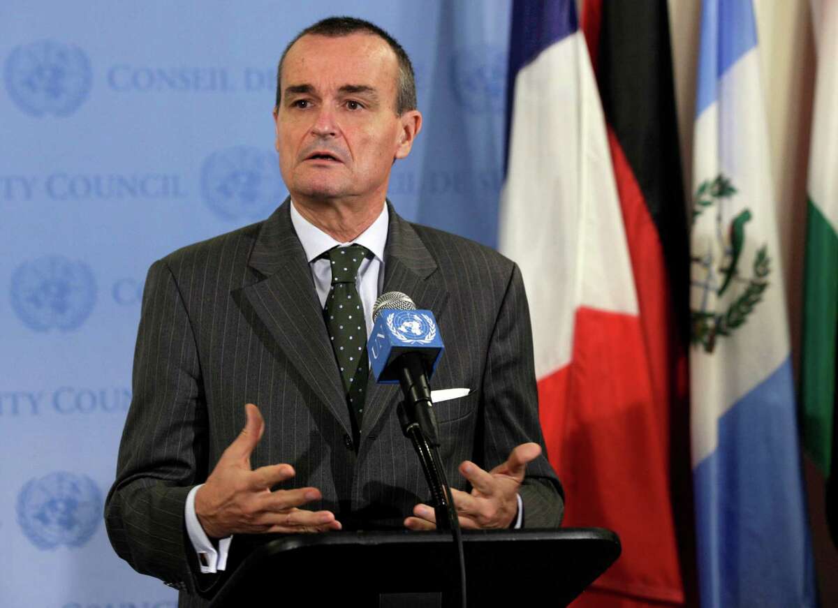 France's U.N. Ambassador Gerard Araud, the current Security Council president, answers reporters' questions at the United Nations after a closed meeting of the Security Council, Thursday, Aug. 16, 2012. The Security Council will let the mandate for the U.N. military observer mission in Syria expire Sunday and will back a new civilian office there to support U.N. and Arab League efforts to end the country's 18-month conflict. (AP Photo/Richard Drew)