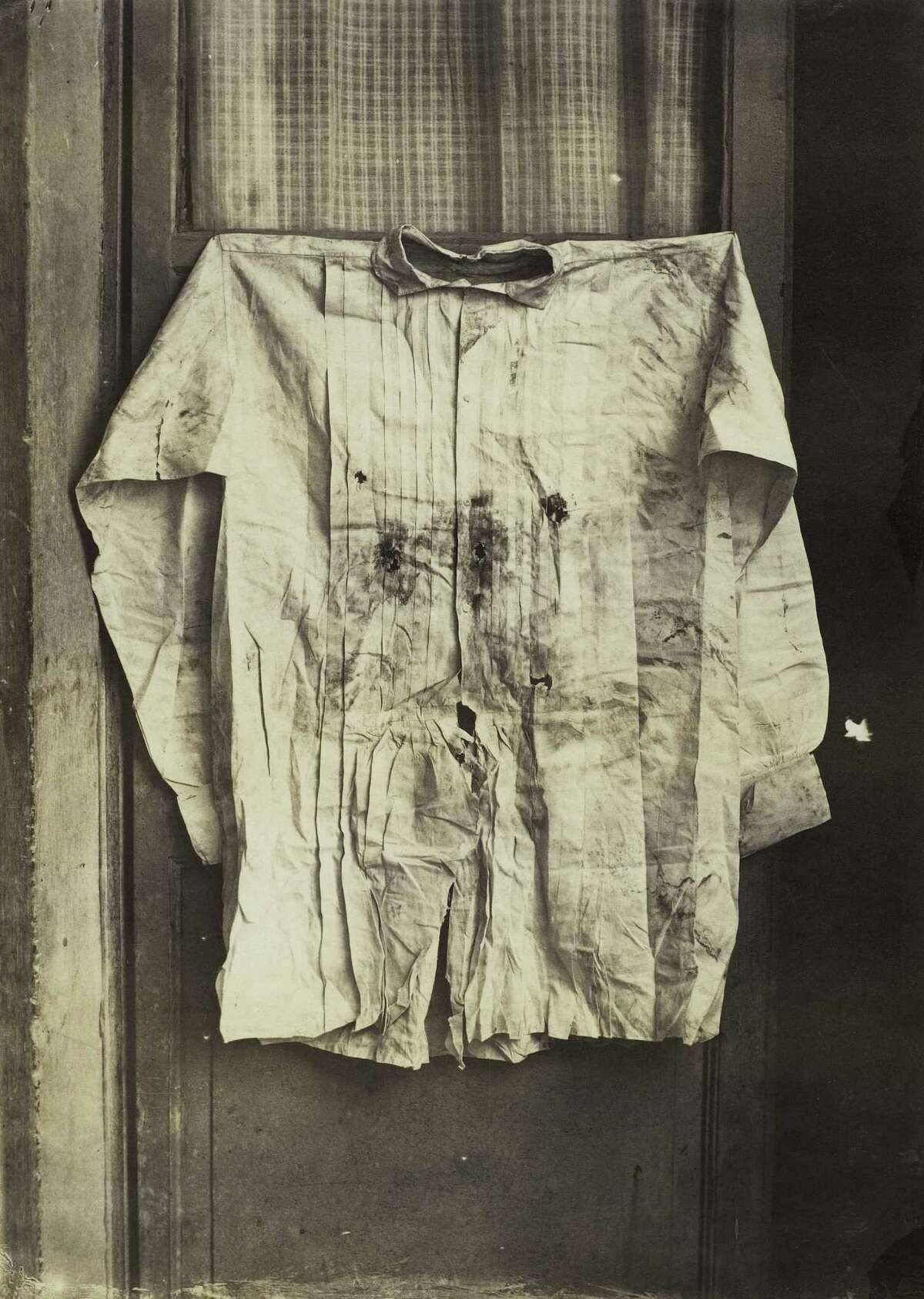 From "WAR/PHOTOGRAPHY: Photographs of Armed Conflict and Its Aftermath", at the Museum of Fine Arts, Houston Nov. 11 - Feb. 3: Francois Aubert, French, 1829 1906: "The Shirt of the Emperor, Worn during His Execution", Mexico, 1867, Albumen print, The Metropolitan Museum of Art, Gilman Collection, Gift of The Howard Gilman Foundation, 2005 Image copyright The Metropolitan Museum of Art. Image source: Art Resource, NY