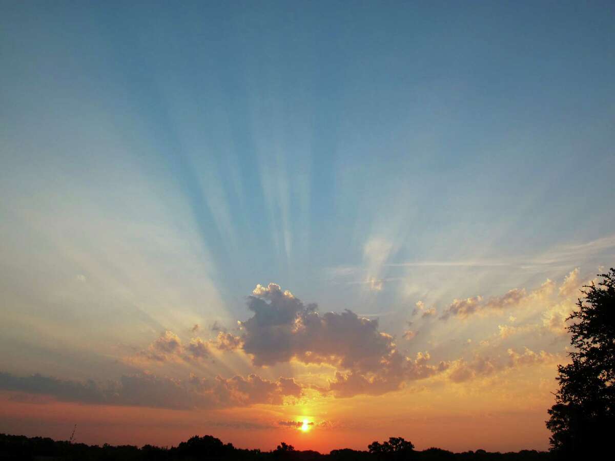 Smoke and dust create crepuscular rays