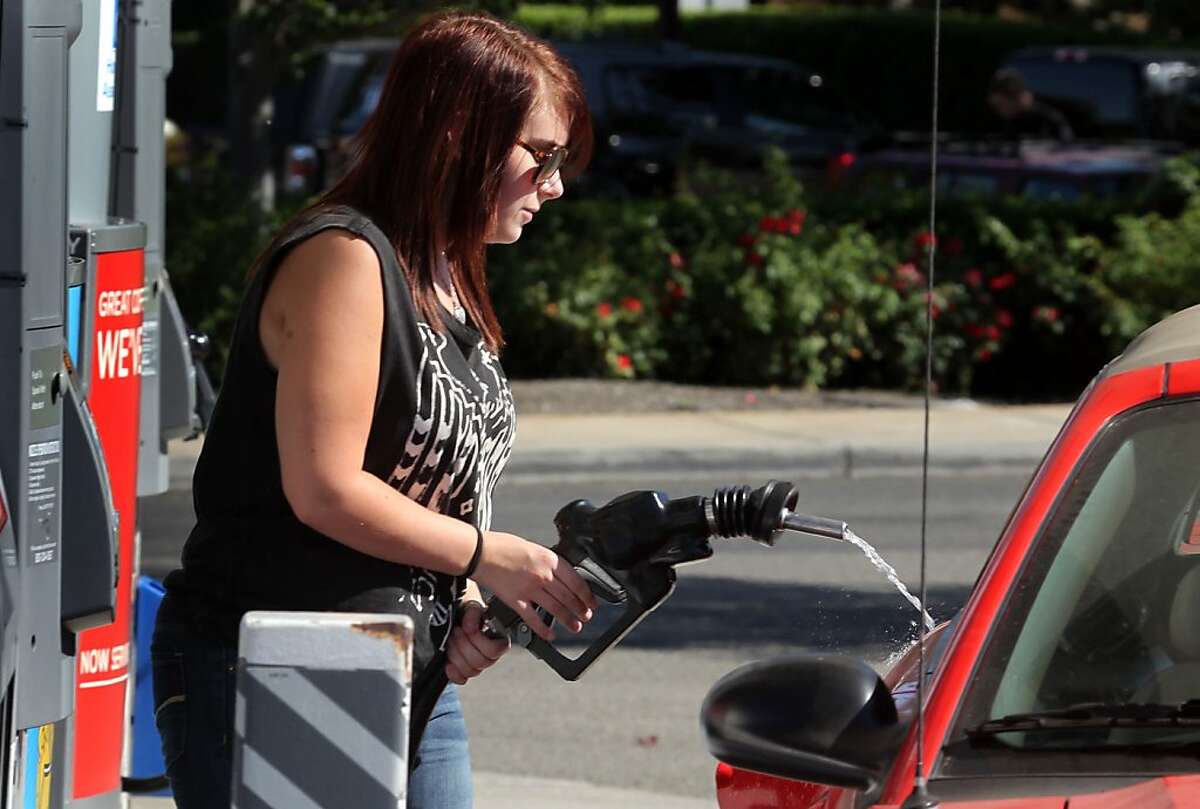 Rachel Lamke, from San Ramon, Calif., paid $4.17.9 per gallon at her local Chevron Oil Company station, Friday August 17, 2012.