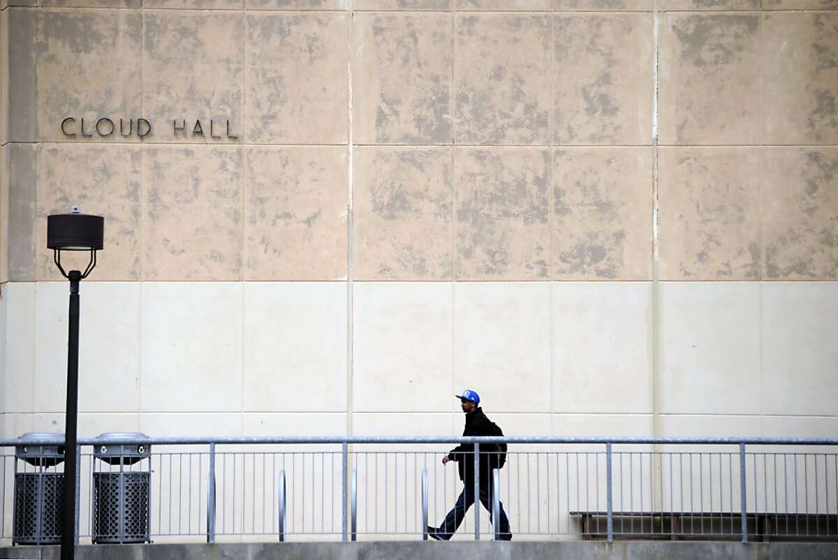 A student is seen between classes outside Cloud Hall at City College of San Francisco on Friday August 17th, 2012