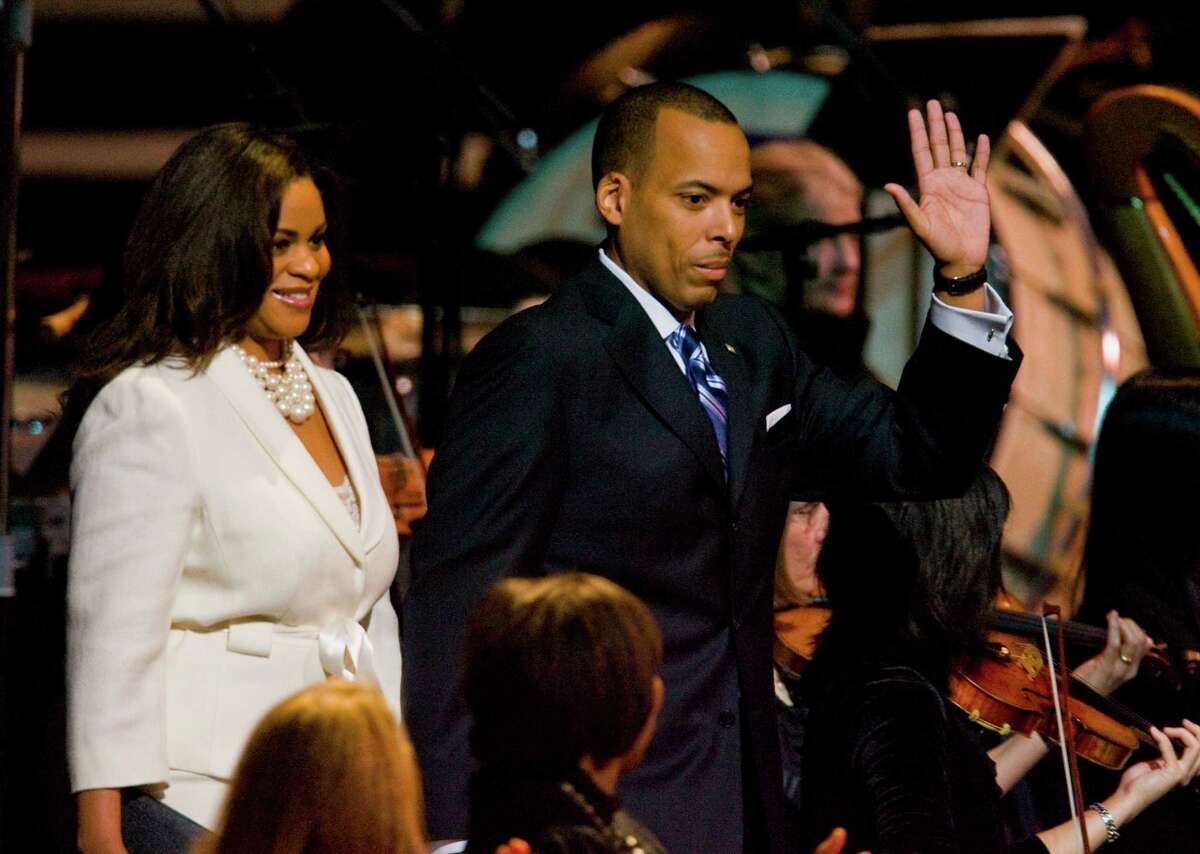 City Controller Ronald Green and his wife, Justice of the Peace Hilary Green, arrive for the public swearing-in of Mayor Annise Parker in January 2010. The couple later divorced in a rancorous proceeding.