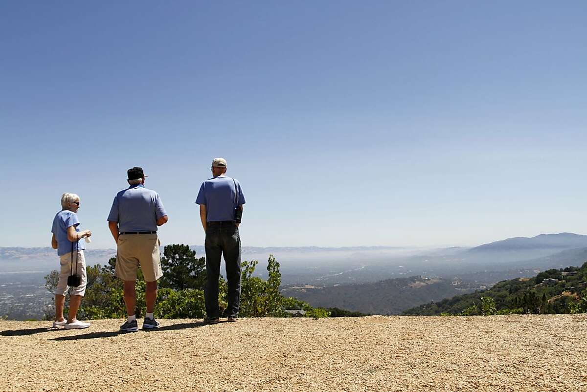 Kay Hudson (left), Early Carrier (center), and Washburn Cabuines (right) take a look from the top of Ridge winery. Ridge is located at the very top of the Santa Cruz mountains.