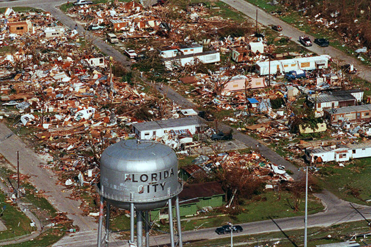 This water tower, a landmark at Florida City, Fla., still stands Aug. 25, 1992, over the ruins of the Florida coastal community that was hit by the force of Hurricane Andrew. The loss of life and property caused by Hurricane Katrina in 2005 is expected to far exceed the wrath of the record-setting Hurricane Andrew, which struck in 1992.