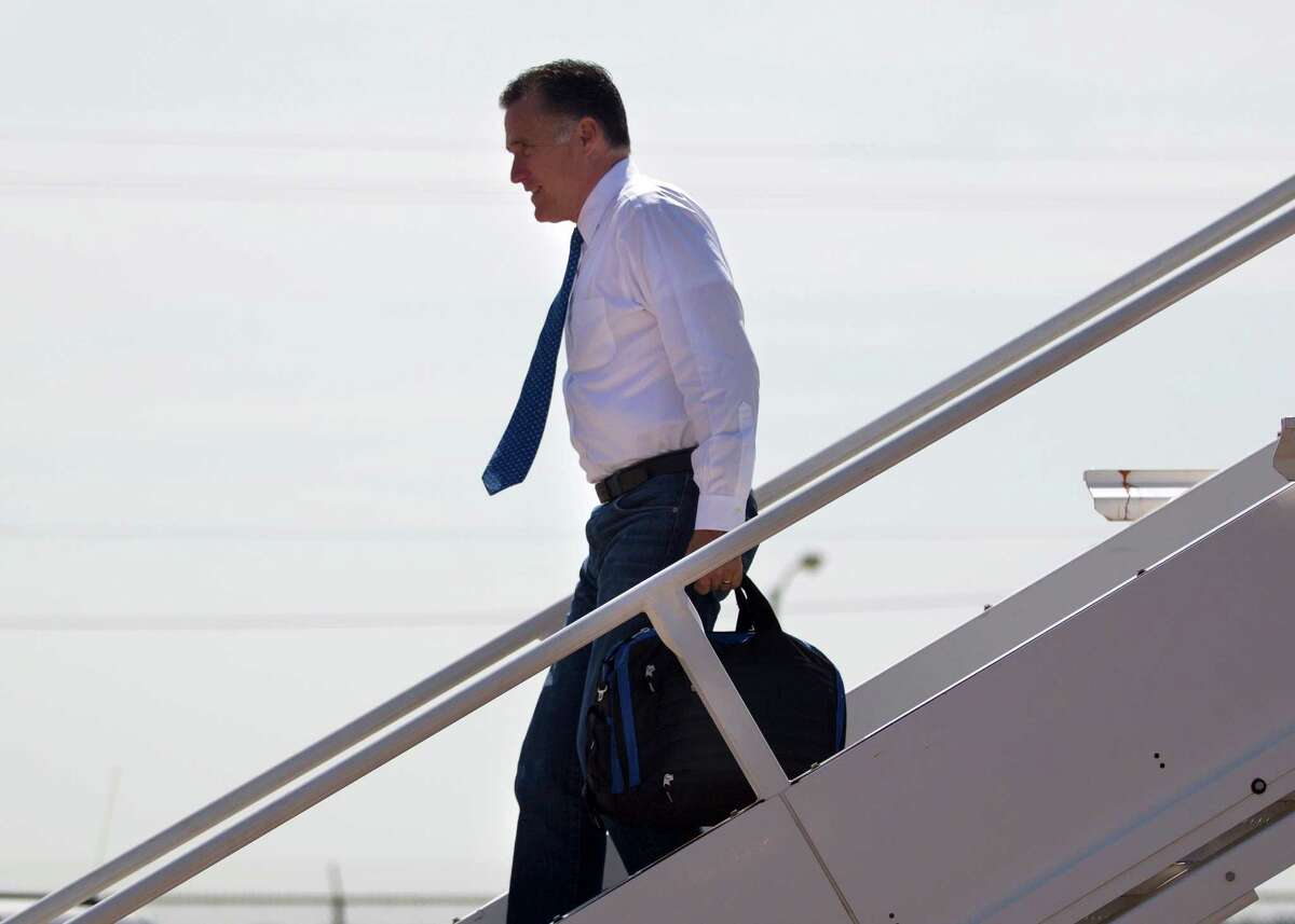 GOP presidential contender Mitt Romney arrives in Houston, touting his aggressive energy policy and collecting donations.