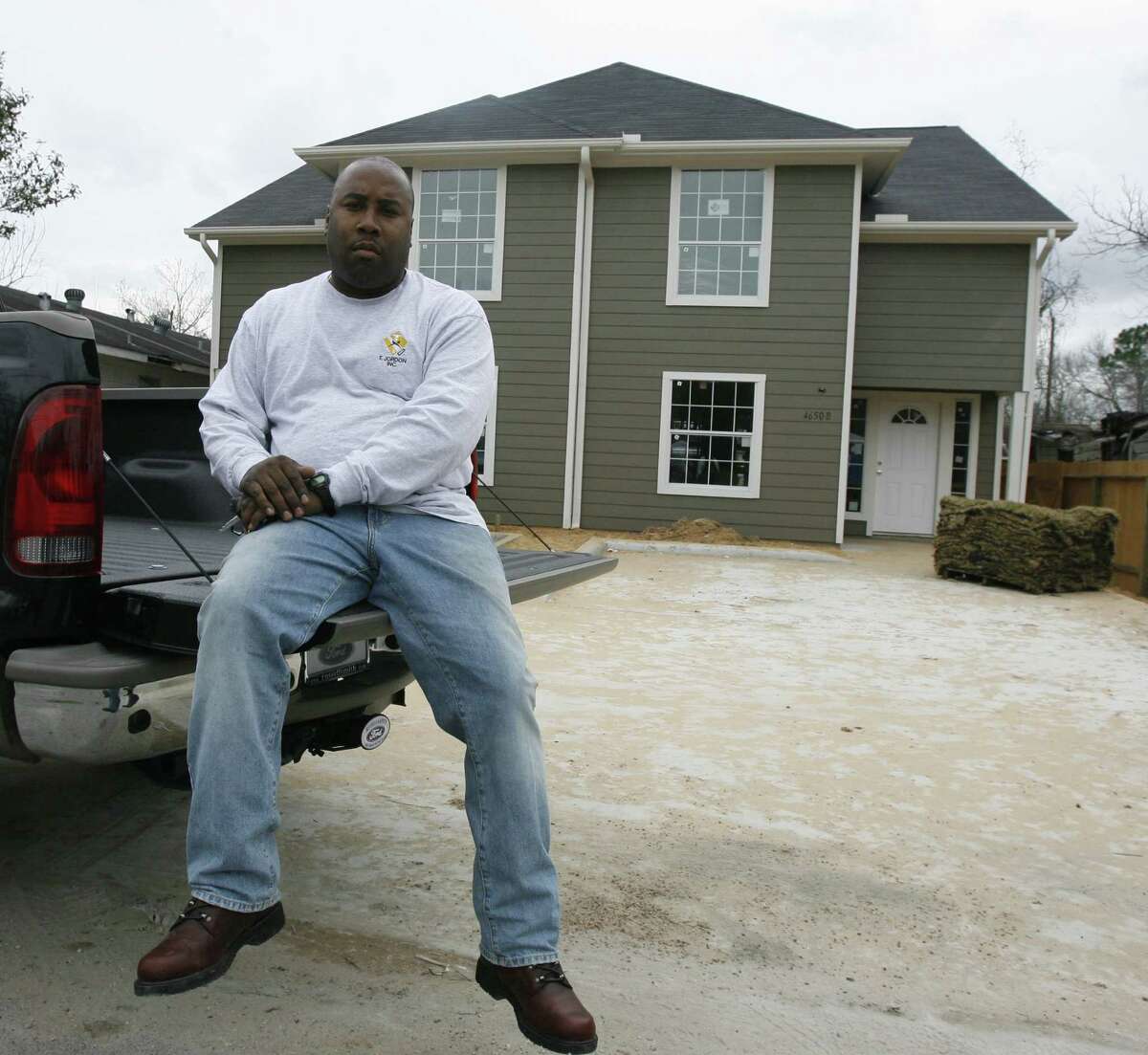 Dwayne Jordon, seen in front of one of his many developments in the Sunnyside neighborhood of Houston in 2007, faces even more legal problems.