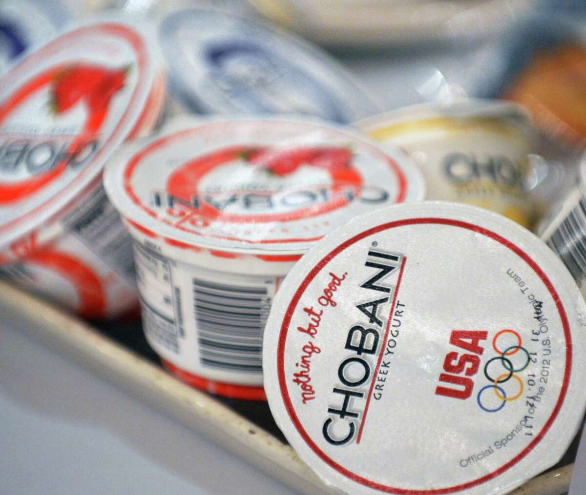 Chobani Greek yogurt on the tables during a Small Business Administration luncheon honoring Hamdi Ulukaya in Colonie Wednesday May 2, 2012. (John Carl D'Annibale / Times Union)