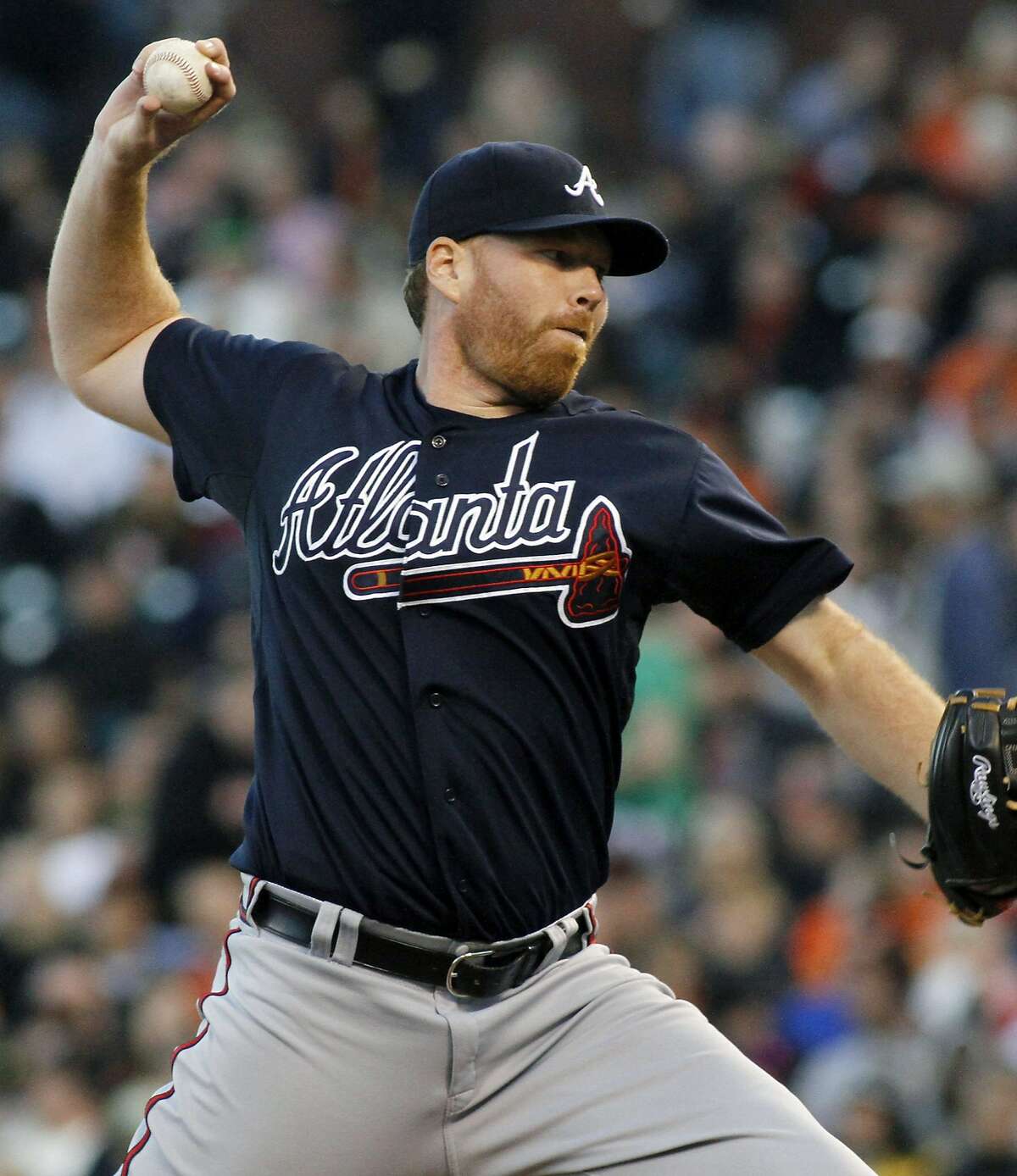 Atlanta Braves pitcher Tommy Hanson throws to the San Francisco Giants during the first inning of a baseball game in San Francisco, Thursday, Aug. 23, 2012. (AP Photo/George Nikitin)