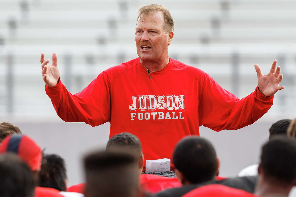 Judson head coach Mark Smith addresses the team following a 2012 summer practice session. Smith left Judson this spring after two years at the helm for the head coaching job at Madison High School.
