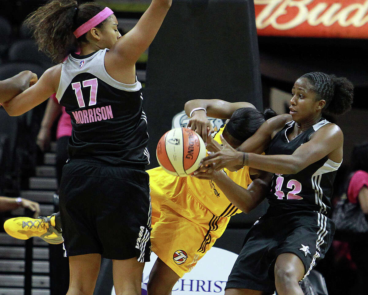 Ziomara Morrison and Shenise Johnson play tough defense in the lane as the Silver Stars host the Tulsa Shock at the AT&T Center on August 25, 2012.
