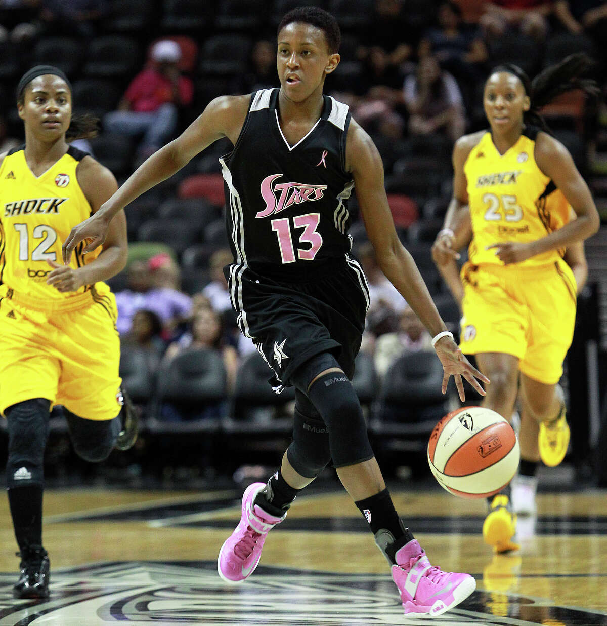 Danielle Robinson bounces into the front court as the Silver Stars host the Tulsa Shock at the AT&T Center on August 25, 2012.