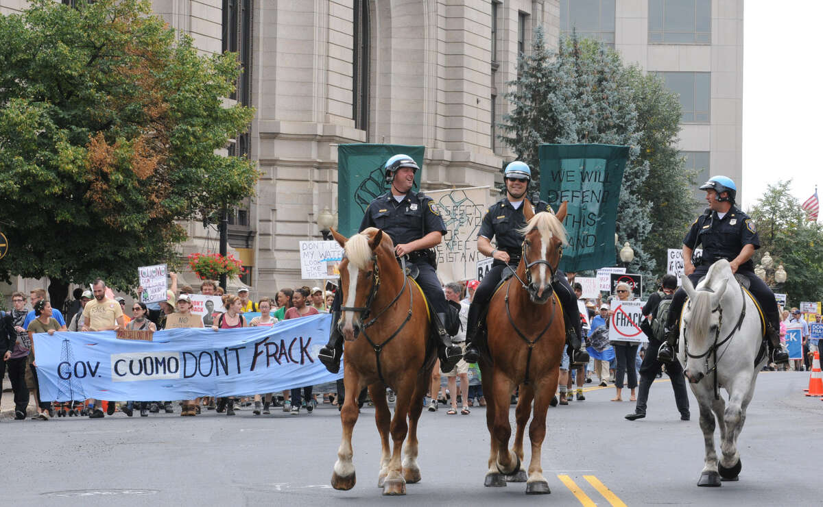 Hundreds march in opposition to fracking
