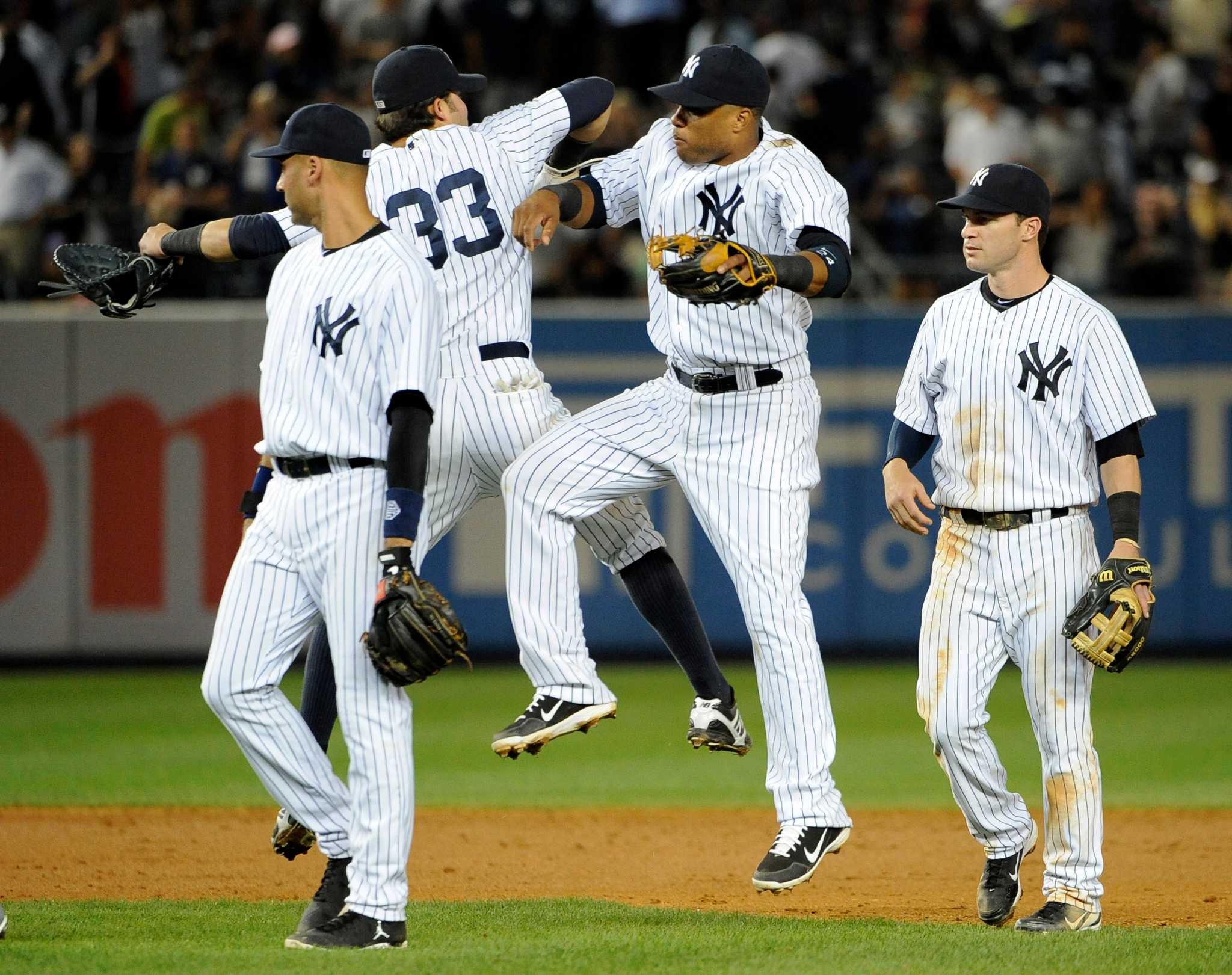 New York Yankees Outfielder Nick Swisher (#33) gets a hit. The