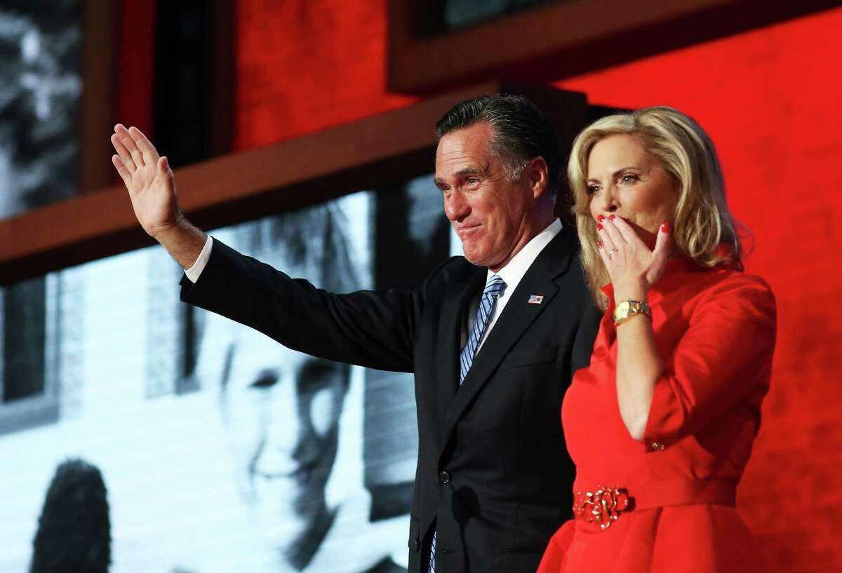 Republican presidential candidate, former Massachusetts Gov. Mitt Romney joins his wife, Ann Romney on stage during the Republican National Convention at the Tampa Bay Times Forum on August 28, 2012 in Tampa, Florida. Today is the first full session of the RNC after the start was delayed due to Tropical Storm Isaac.