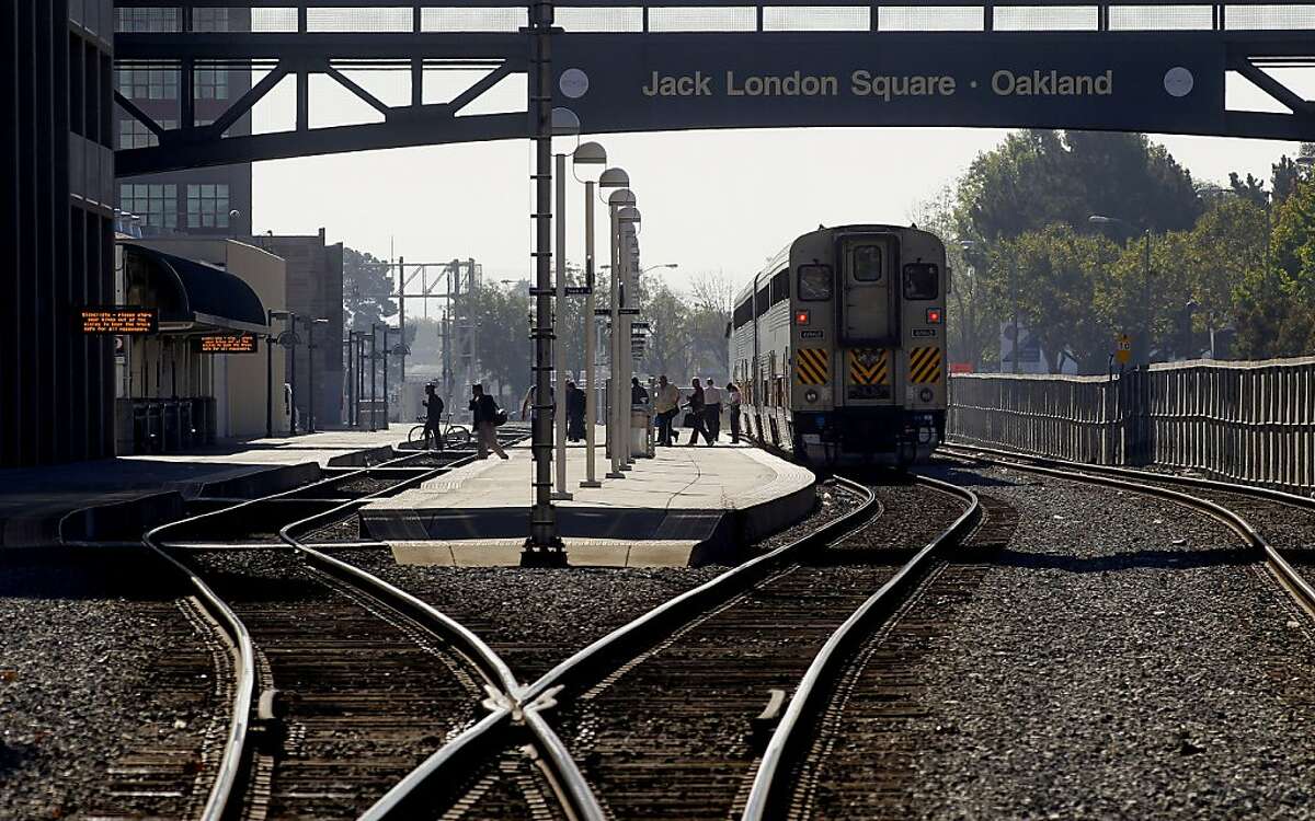 In this file photo, passengers disembark an Amtrak train at the Jack London Square station, in Oakland.
