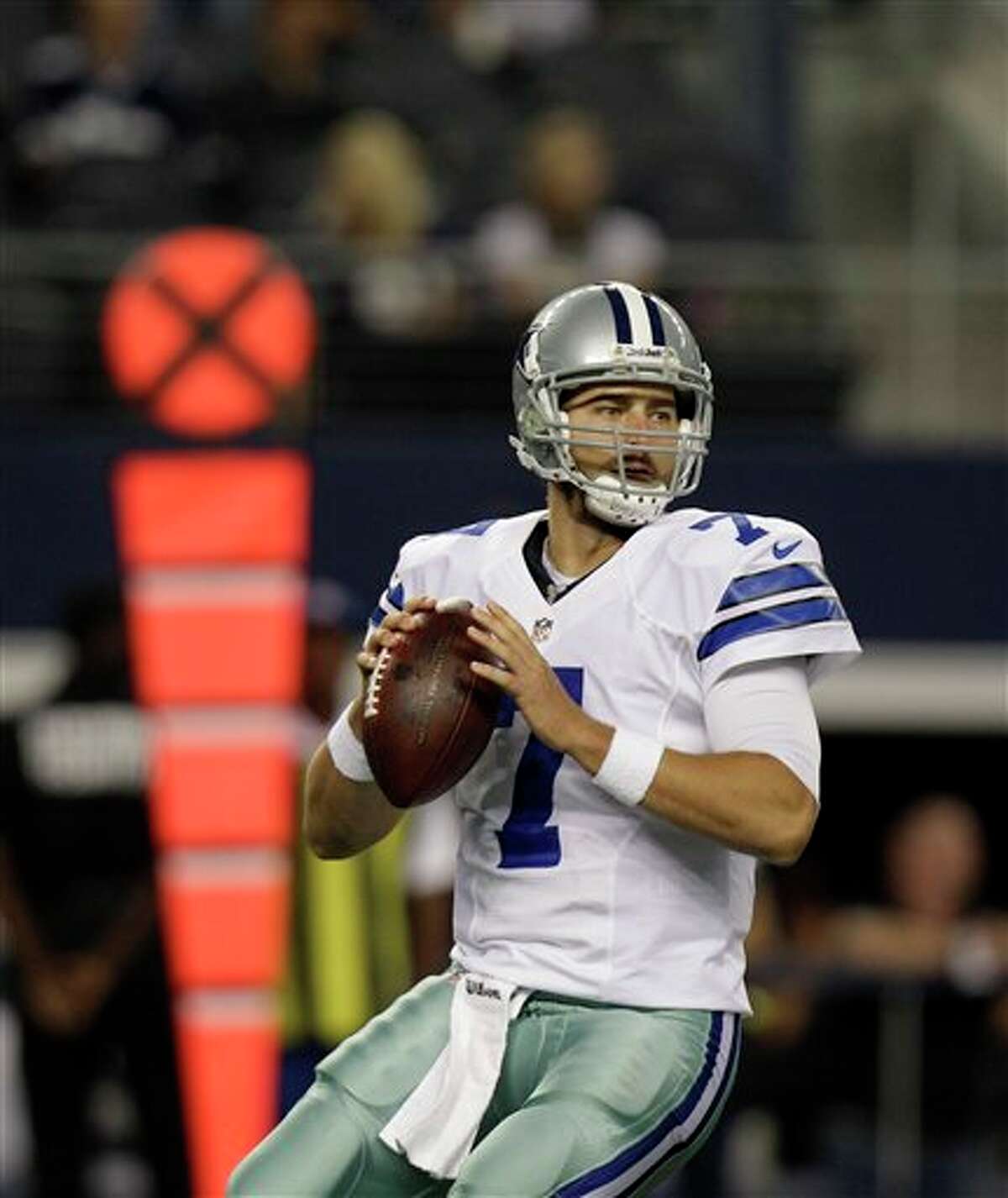 Dallas Cowboys' Stephen McGee (7) passes in the first half of a preseason NFL football game against the Miami Dolphins Wednesday, Aug. 29, 2012, in Arlington, Texas. (AP Photo/LM Otero)