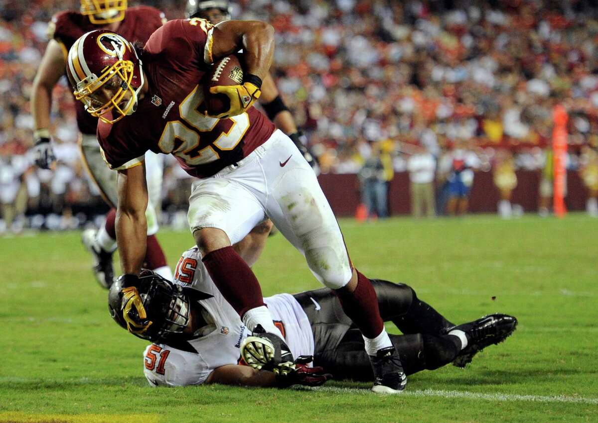 After sitting out the last two games with a sore Achilles, Redskins running back Roy Helu Jr. rushed for 90 yards and two TDs Wednesday. He could end up being Washington's starter.