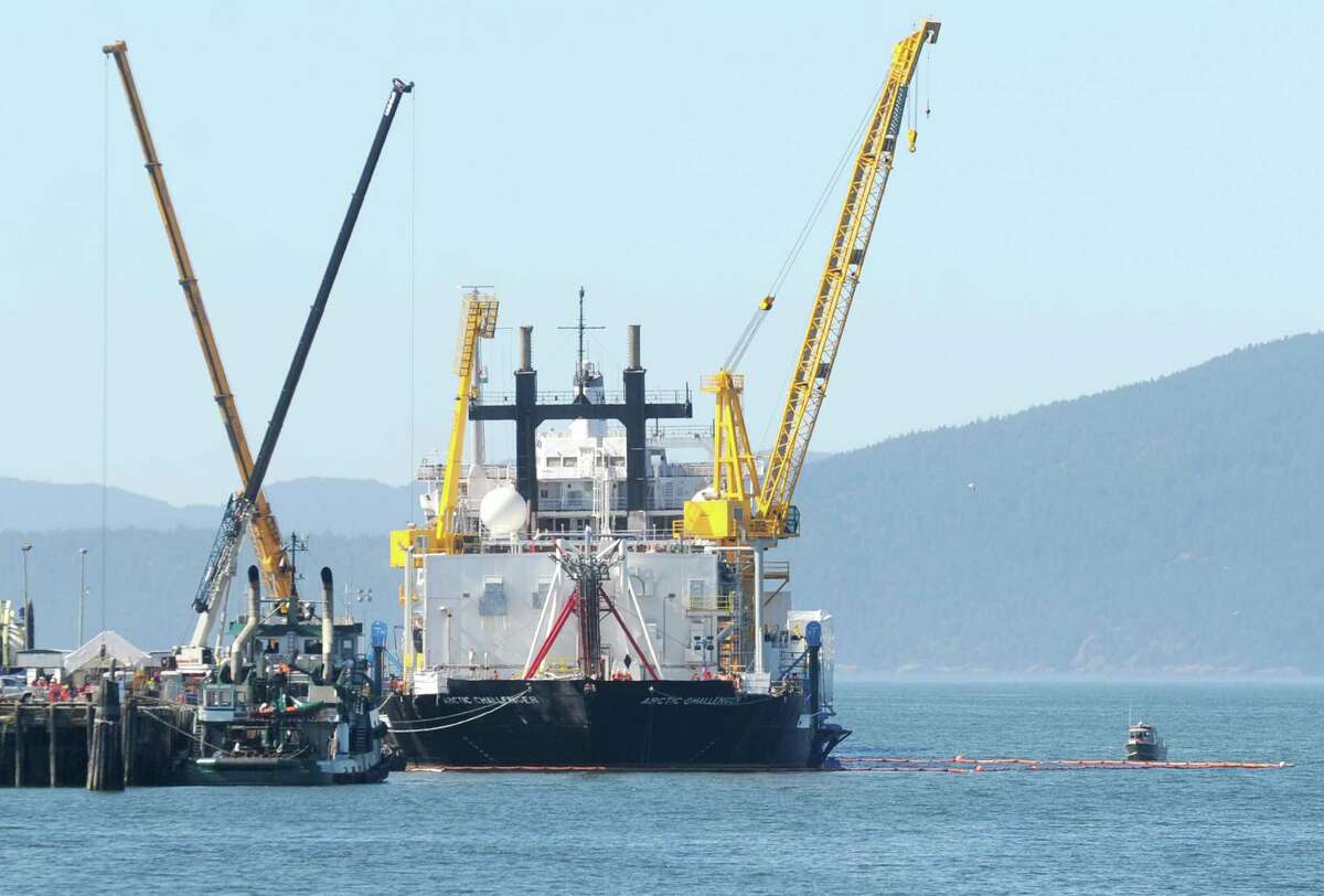 The Arctic Challenger, a containment barge designed to capture oil spilled during drilling, is seen Wednesday, Aug, 15, 2012, in Bellingham, Wa. Minor oil spills have plagued construction of the Arctic Challenger, the oil spill containment barge Shell Oil is waiting for to drill exploratory wells in the Arctic Ocean off Alaska. Hydraulic systems leaked on July 24, Aug. 4 and Aug. 6, each releasing about a quart of oil into Whatcom Waterway, the Washington state Ecology Department said. The department sent a notice of violation to Superior Energy Services, which is building the Arctic Challenger, The Bellingham Herald reported Thursday, Aug. 16, 2012. (AP Photo/Bellingham Herald, Russ Kendall)