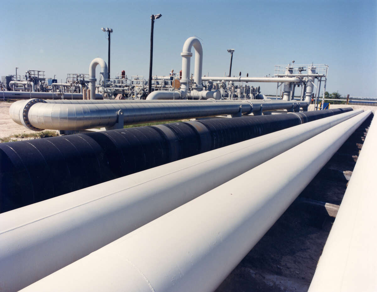 An undated photo provided by the Energy Department shows crude oil pipes at the Bryan Mound site near Freeport, Texas. The U.S. emergency fuel tank _ the Strategic Petroleum Reserve _ is almost full for the first time since its creation about 30 years ago. The most obvious significance is that it gives the country a larger energy-security blanket than ever for the economy in the event of a future supply disruption. And the federal budget will get a small boost as oil companies resume paying royalties in cash, not oil, for operating on government lands. But the stockpiling of 700 million barrels of oil, which is scheduled for completion by the end of August, also could bring some immediate relief to the global energy market. (AP Photo/Energy Department).
