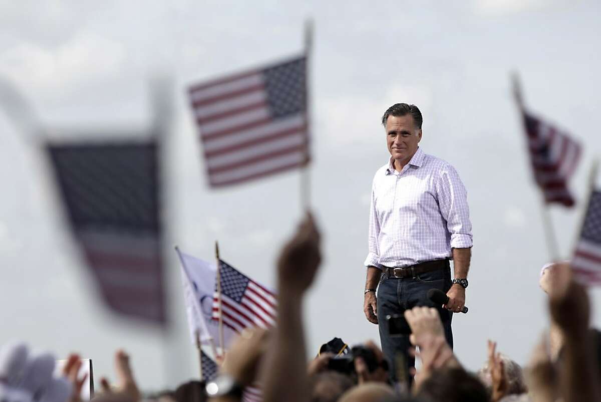 Republican presidential candidate, former Massachusetts Gov. Mitt Romney appears on stage during a campaign event at Lakeland Linder Regional Airport, Friday, Aug. 31, 2012, in Lakeland, Fla. (AP Photo/Mary Altaffer)