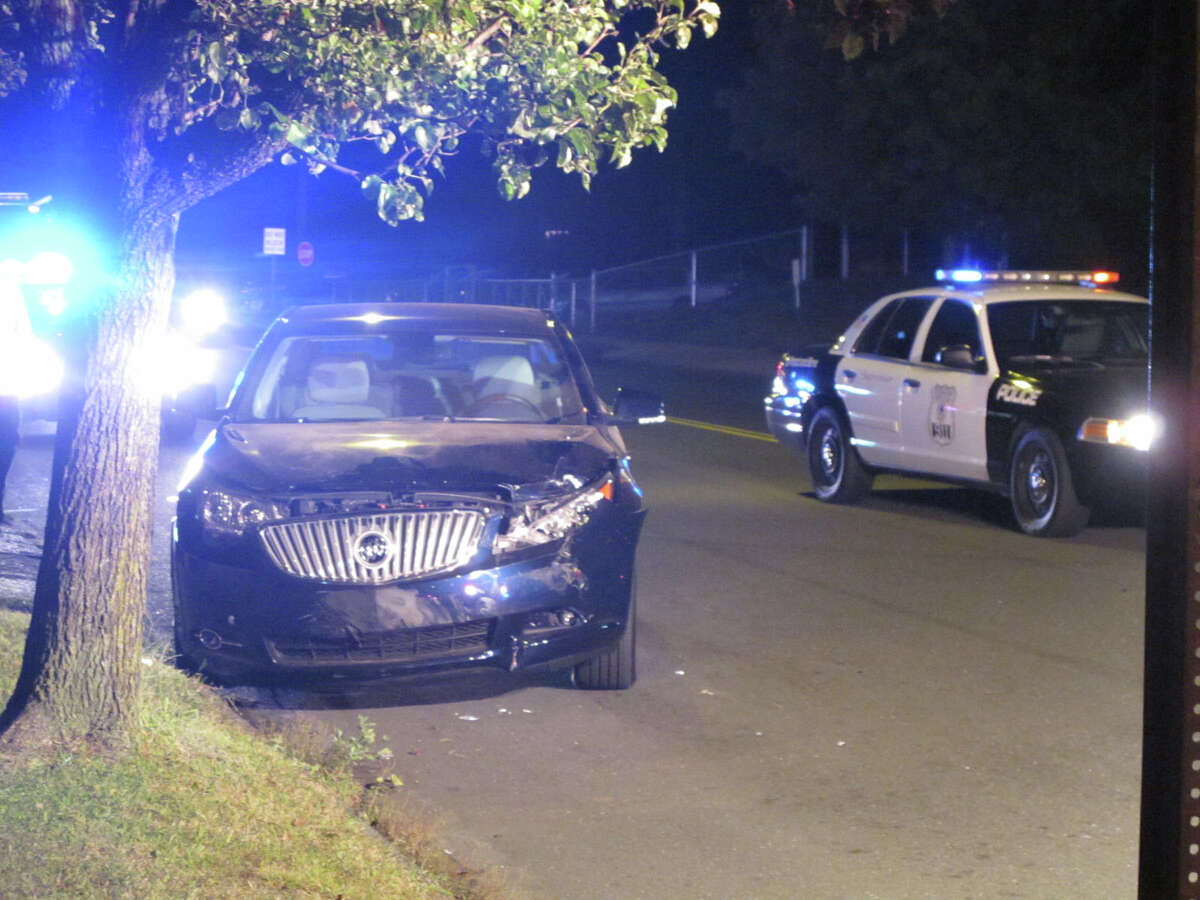 Man injured after pickup truck hits building