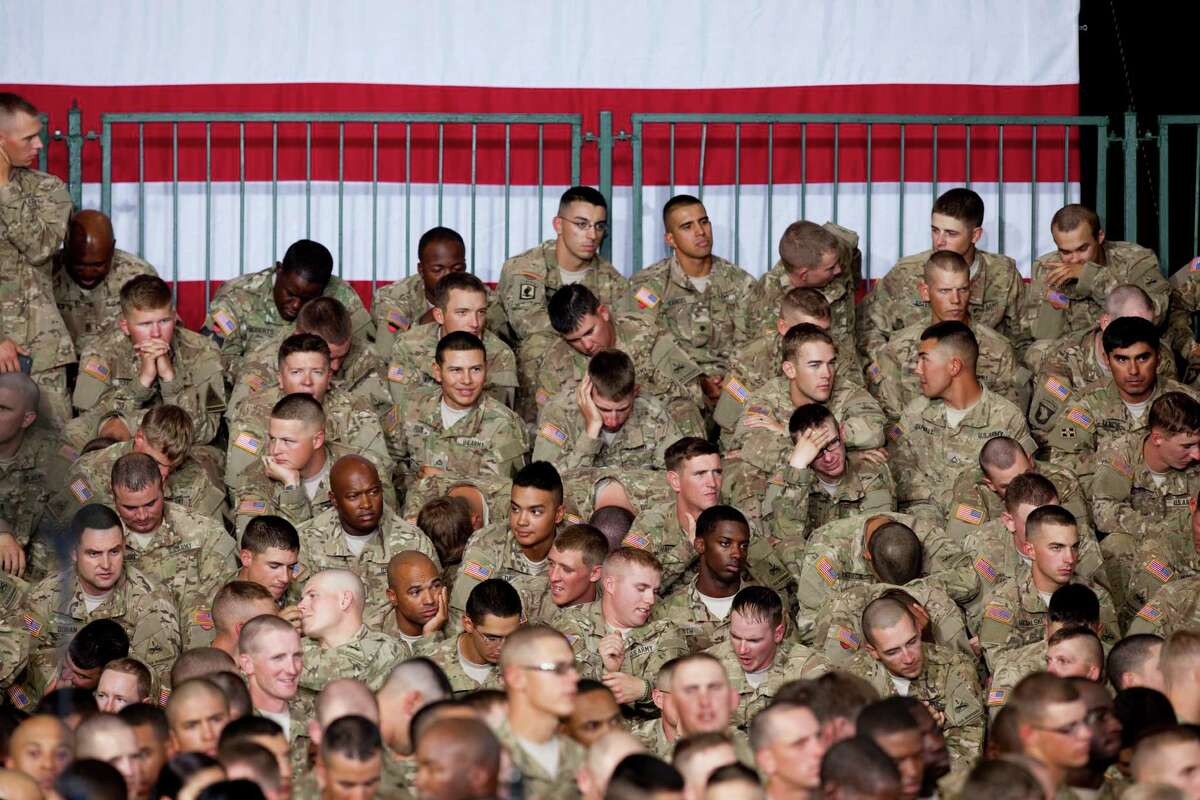 Fort Bliss soldiers wait for President Barack Obama to arrive to address them at Fort Bliss Military Instillation on Friday August 31, 2012. The President met privately with service members and their families and to highlight the second anniversary of the end of combat operations in Iraq. Photo by Ivan Pierre Aguirre