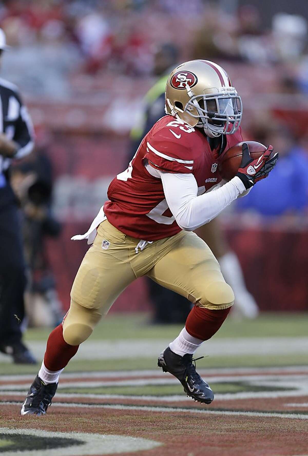 Kendall Hunter of the San Francisco 49ers rushes during the game