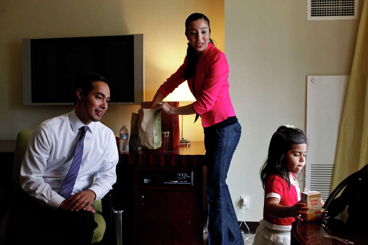 Mayor Julian Castro takes a break from rehearsing his keynote speech with his wife, Erica Castro, and their daughter, Carina, 3, in their hotel room a few hours before the start of the Democratic National Convention in Charlotte, NC on Tuesday, Sept. 4, 2012.