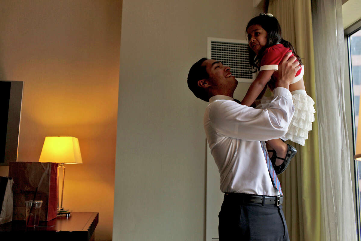 Mayor Julian Castro takes a break with his daughter, Carina, 3, in their hotel room as he prepares for his keynote speech during the Democratic National Convention in Charlotte, NC on Tuesday, Sept. 4, 2012.