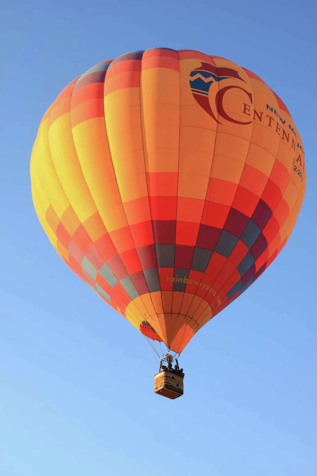Almost every dawn of the year, hot air balloons rise like jewels in the sky over Albuquerque, New Mexico.
