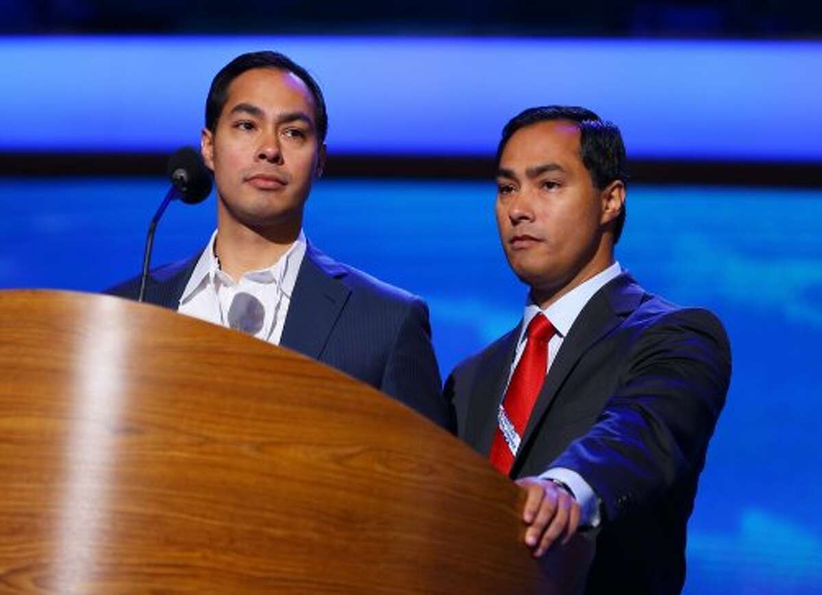 San Antonio Mayor Julian Castro, left, and brother Joaquin Castro stand at the podium during preparations for the Democratic National Convention at Time Warner Cable Arena on September 2, 2012 in Charlotte, North Carolina. The DNC that will start on September 4 and run through September 7, will nominate U.S. President Barack Obama as the Democratic presidential candidate. (Joe Raedle / Getty Images)