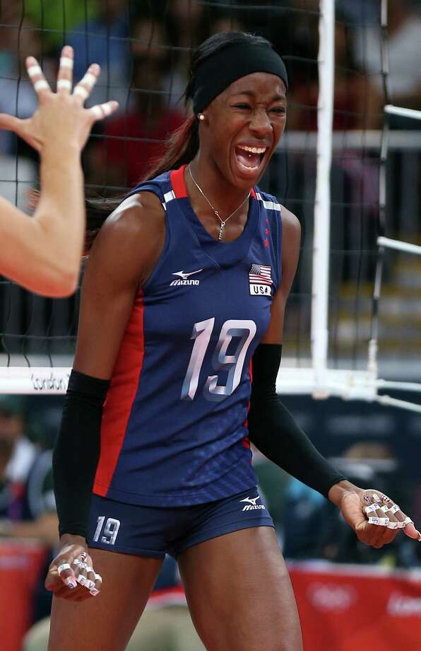 Destinee Hooker #19 of United States celebrates a point in the third set ag...