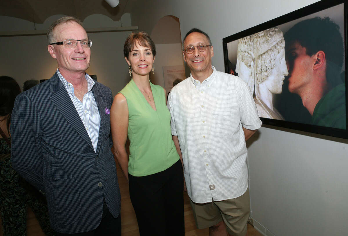 San Antonio Museum of Art trustee Banks Smith (from left) joins Fotoseptiembre directors Ann Kinser and Michael Mehl during the opening reception for “Intimate Encounters” at the San Antonio Museum of Art.    