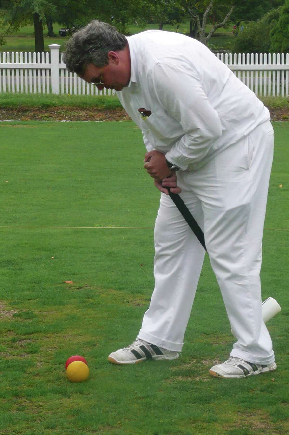 Going through hoops Croquet is easy to play, but hard to master