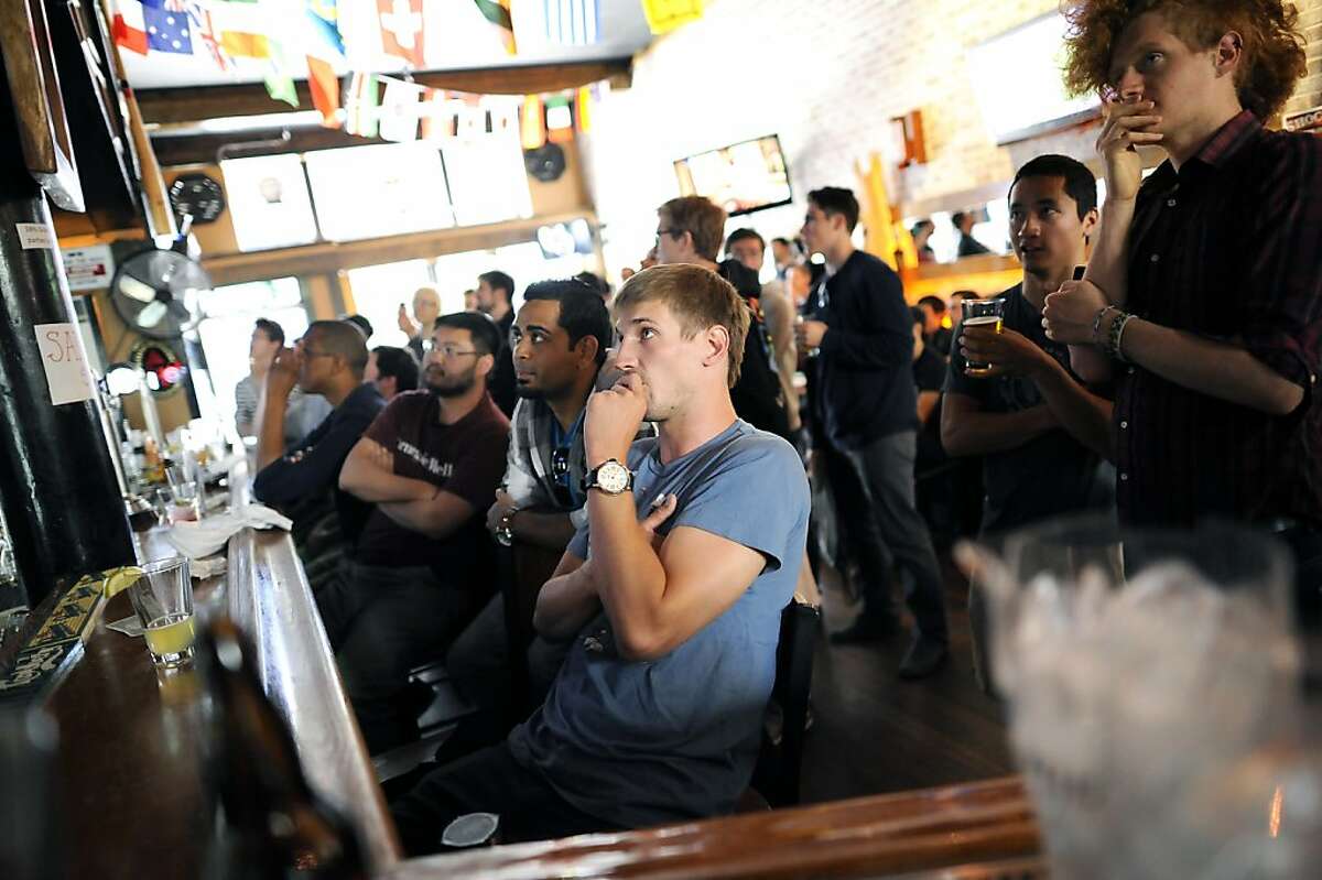 Just like any broadcast sporting event, the mostly male crowd had their eyes glued to the TVs behind the bar. "Barcraft", a Starcraft video game competition viewing, was held at Mad Dog in the Fog Pub in San Francisco, CA Sunday August 26th, 2012.
