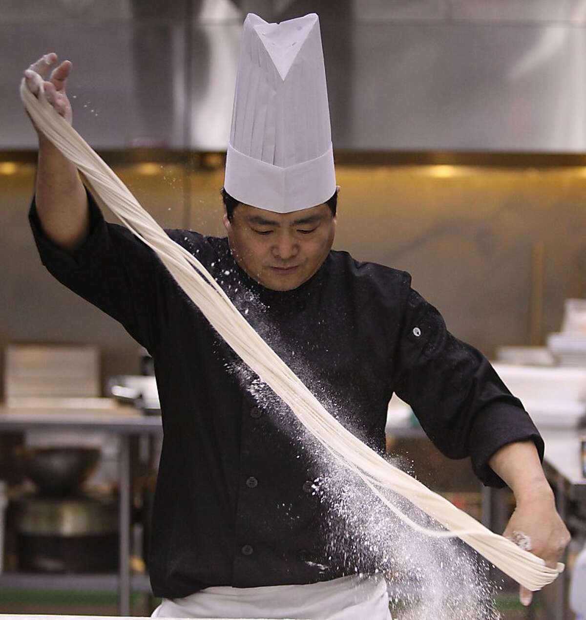 Master chef de cuisine Tony Wu shows how to pull noodles in Millbrae, Calif., on Thursday, August 23, 2012.